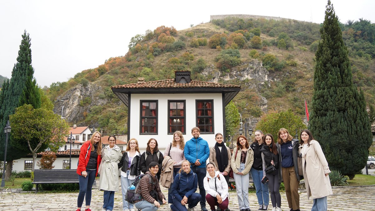 People standing in front of a building